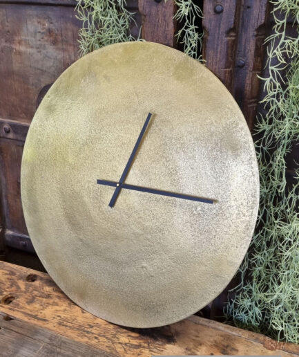 Horloge en métal doré taille M